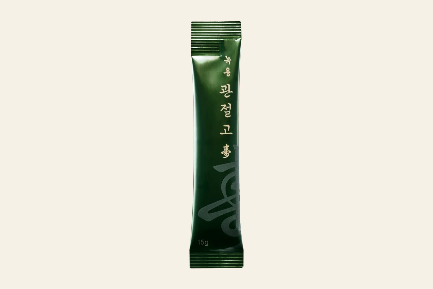 짙은 초록빛 스틱형 한약 한 포 — 경희미르애한의원 녹용관절고